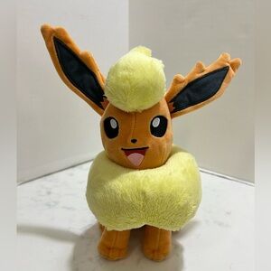 Big Pokemon Fluffy Yellow and Brown Plush Toy. Used excellent conditions.